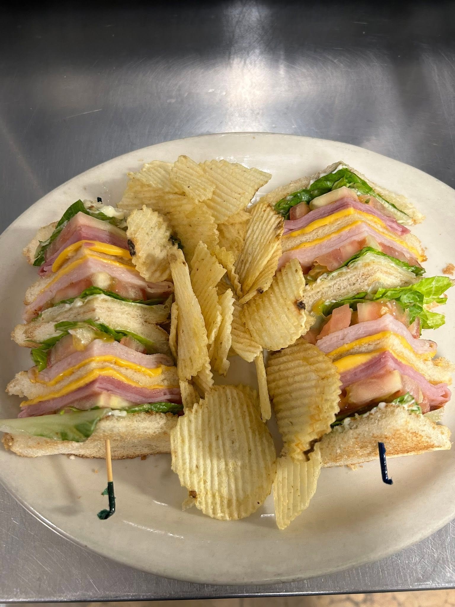 Club sandwich with potato chips